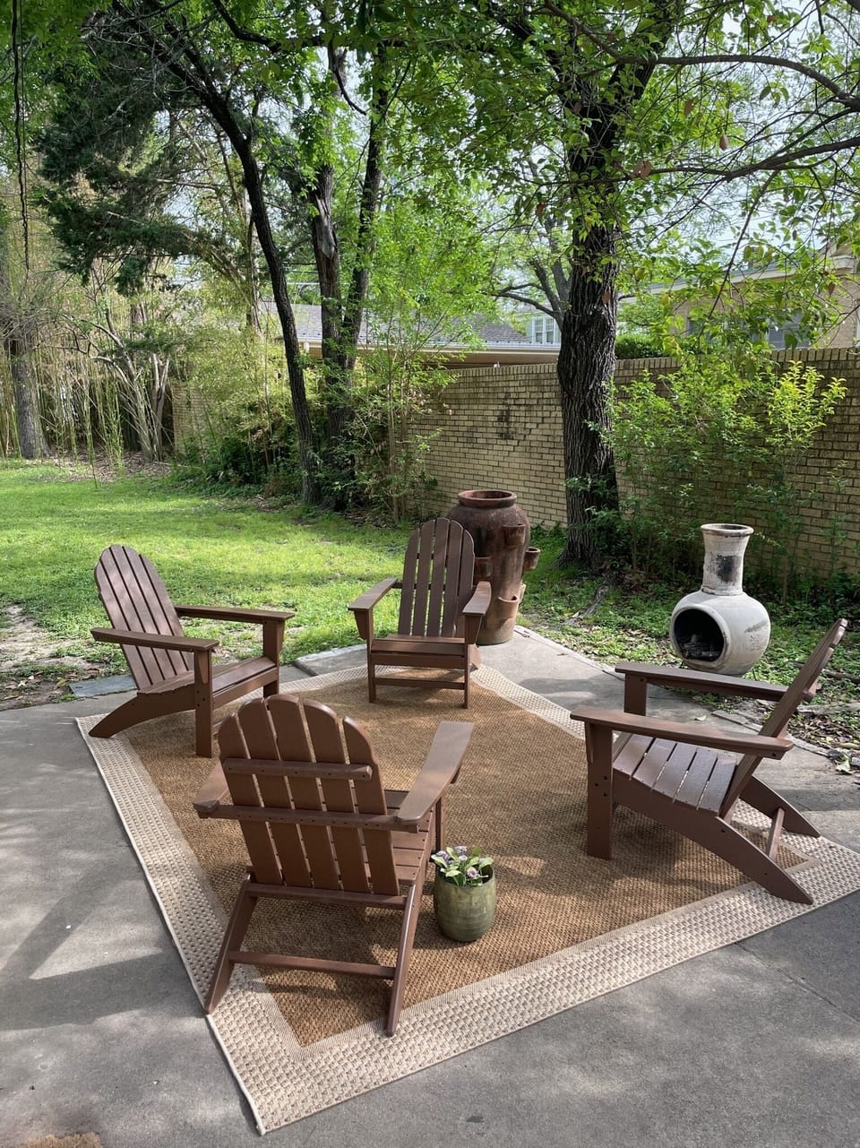 Outside back patio seating with Propane fire pit.