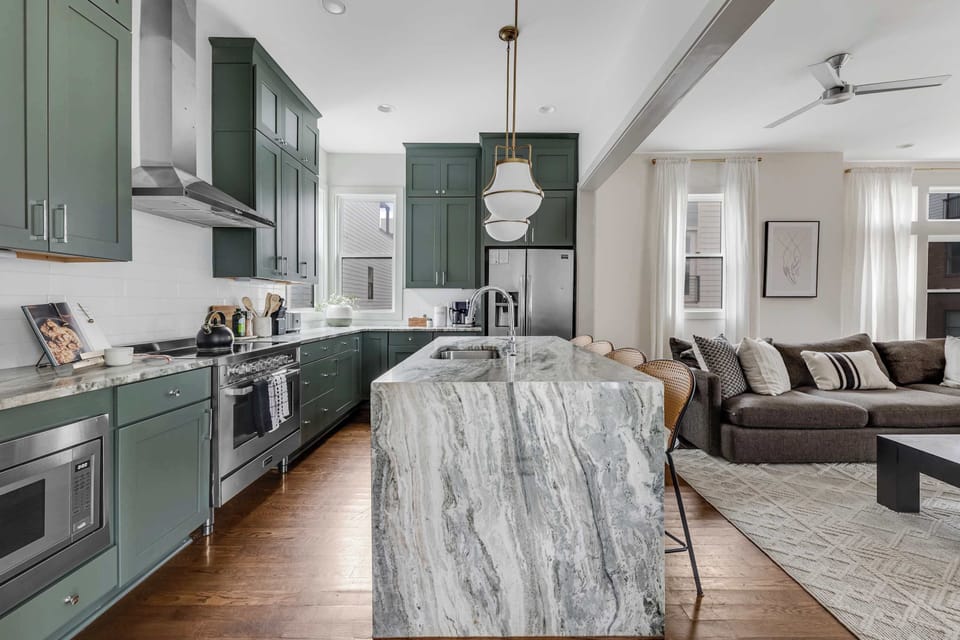 Modern kitchen flows seamlessly into the living space for easy entertaining.