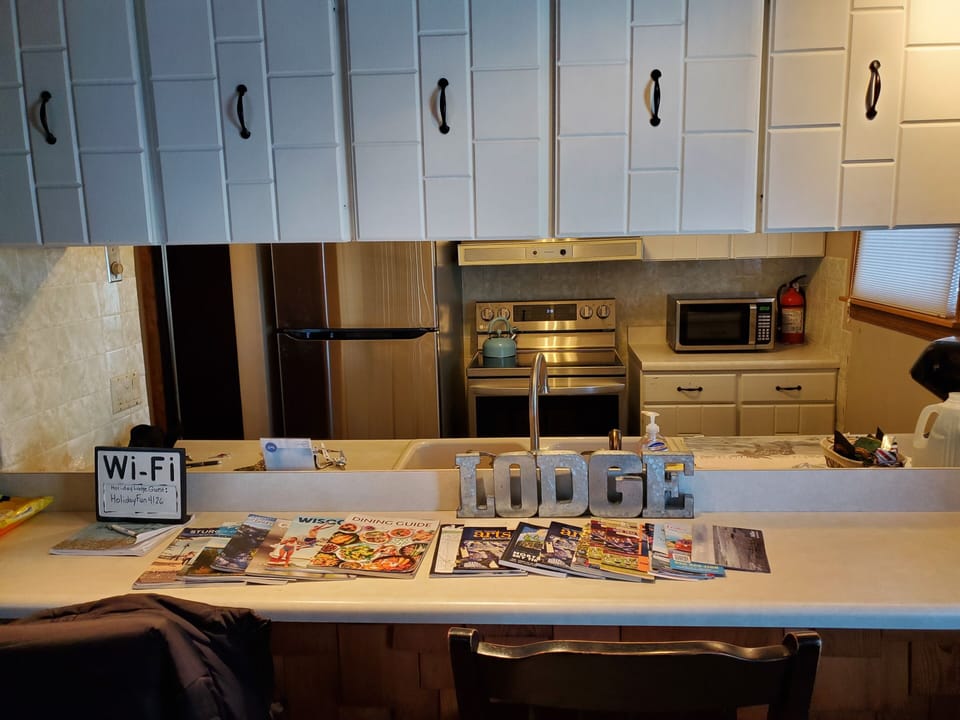 Kitchen new stainless fridge and stove