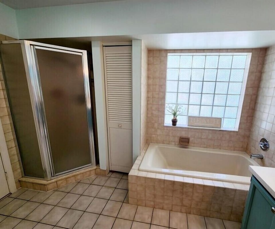 Master bathroom with shower and tub.