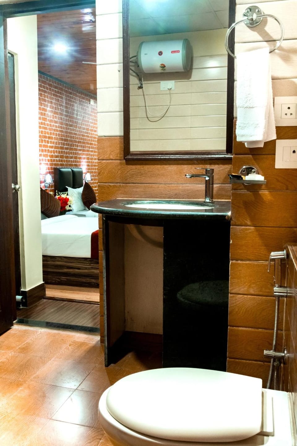 Shower, rainfall showerhead, towels, soap