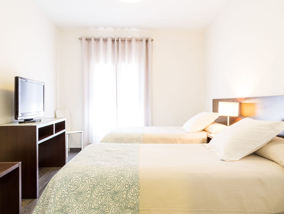 Desk, blackout drapes, iron/ironing board, free WiFi