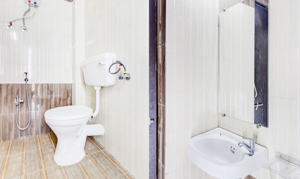 Economy Double Room | Bathroom | Shower, free toiletries, towels, soap