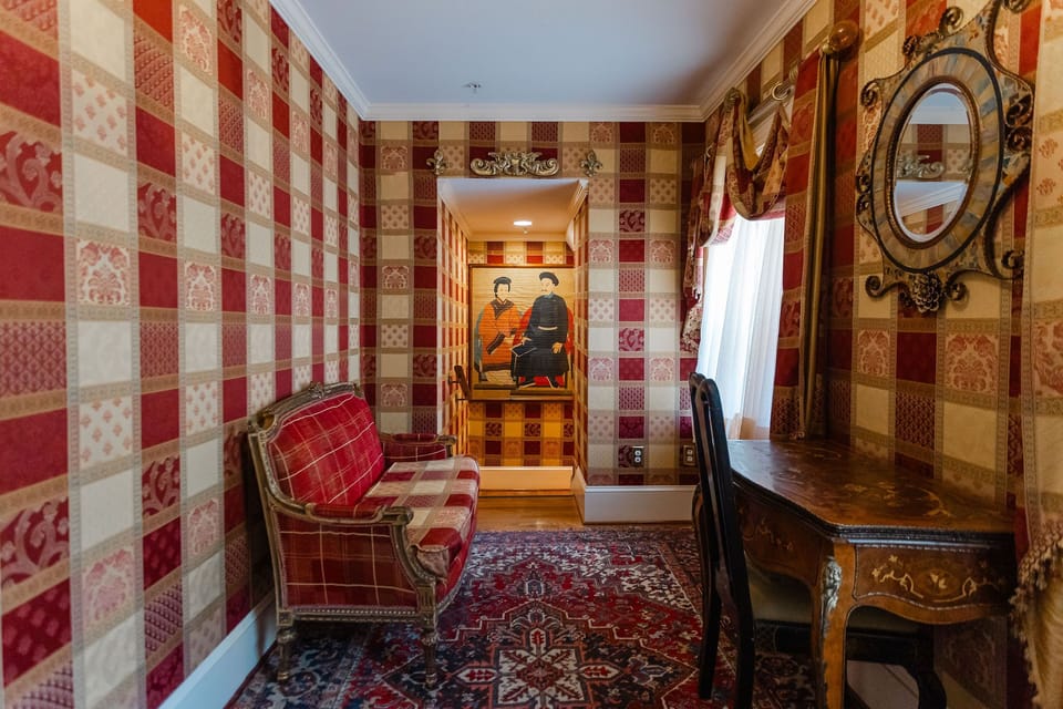 301 Caton Suite | Living area | 37-inch flat-screen TV with cable channels, TV, fireplace