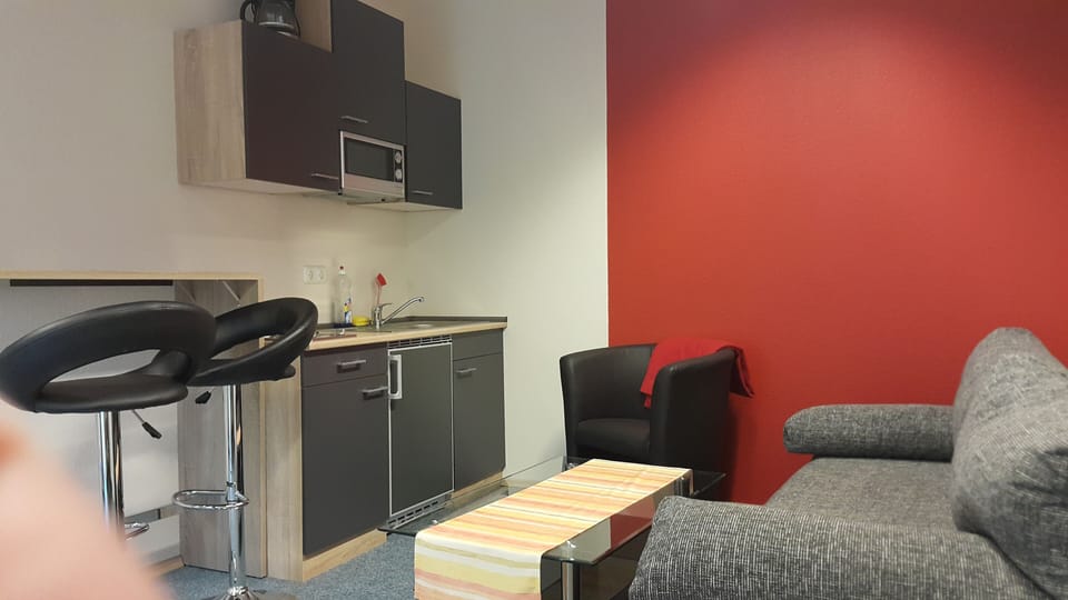 Suite, 1 Bedroom | Living area | LED TV