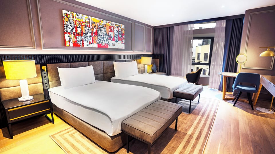 Luxury Room (Bosphorus View) | Minibar, in-room safe, desk, laptop workspace