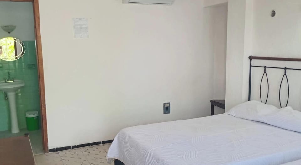Standard Room, 2 Double Beds | Down comforters, desk, WiFi (free), bed sheets