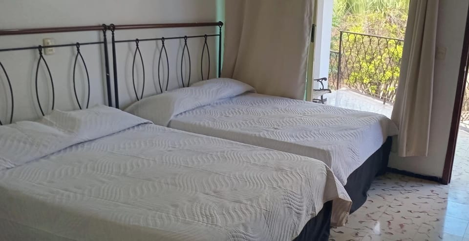 Down comforters, desk, WiFi (free), bed sheets