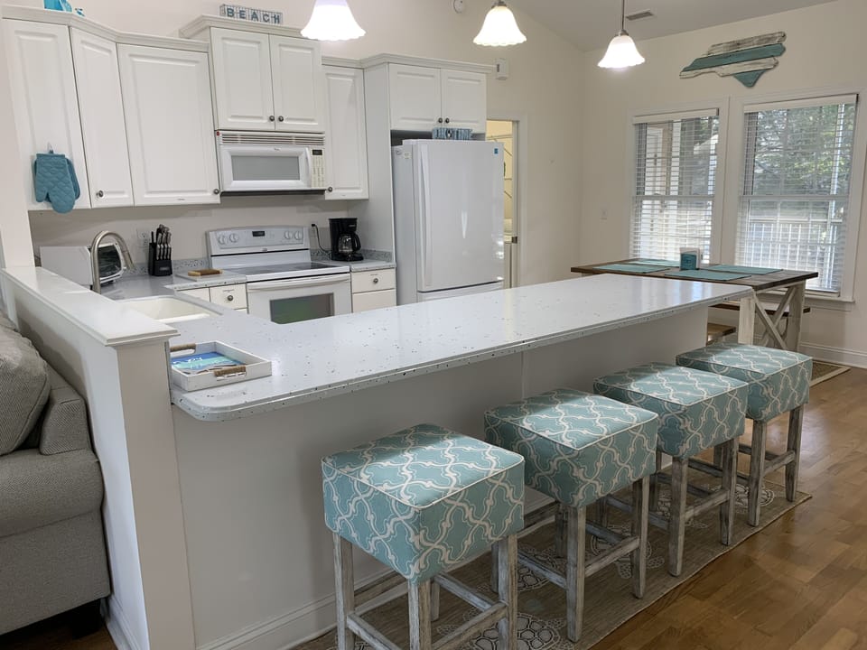 Kitchen Counter can seat 4 comfortably.
