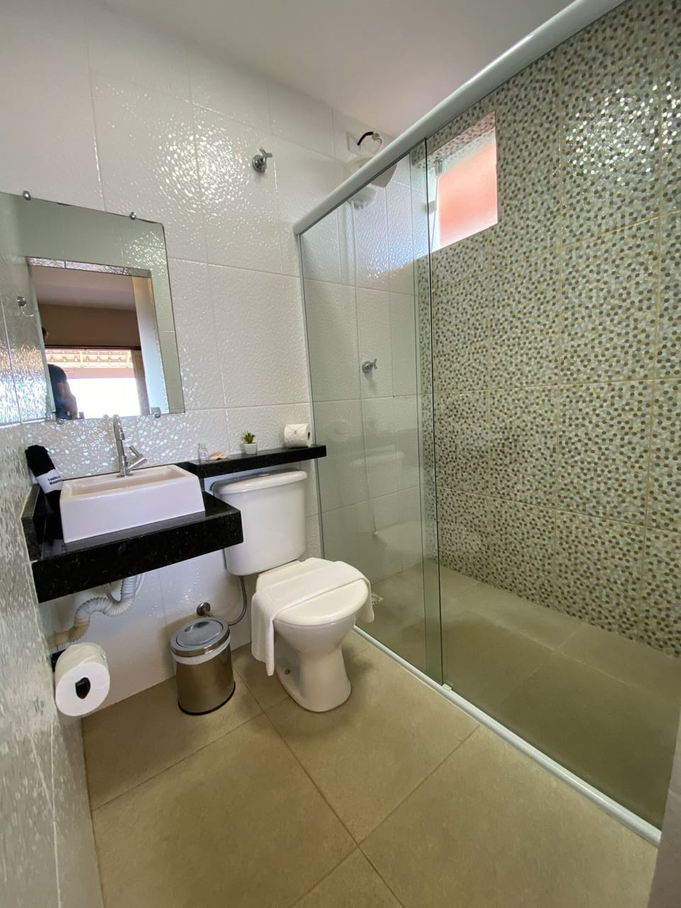 Deluxe Studio Suite | Bathroom | Shower, towels, soap, toilet paper