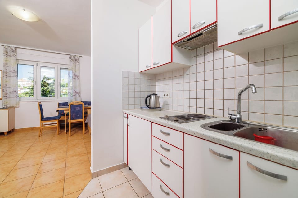 Apartment (A1) | Private kitchen | Fridge, stovetop, espresso maker, electric kettle