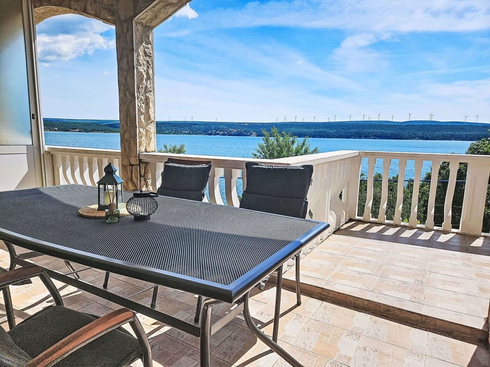 Furniture, Coastal And Oceanic Landforms, Outdoor Furniture, Sea, Coast, Chair, Ocean, Shade, Lake, Deck