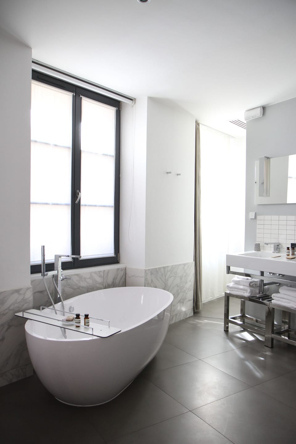 Designer toiletries, bathrobes, slippers, towels