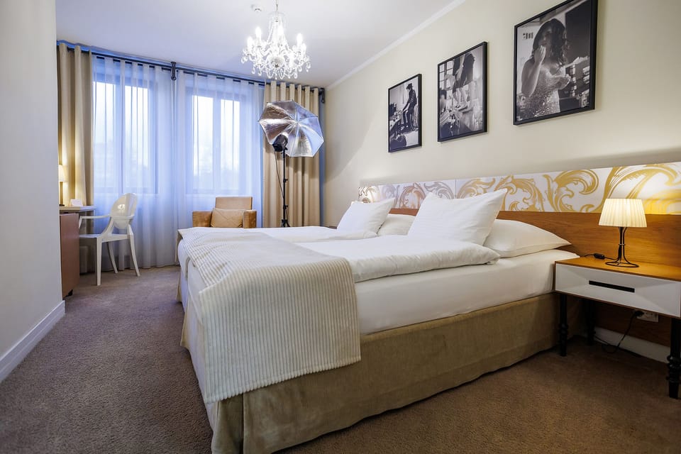 Classic Double Room | Minibar, in-room safe, desk, iron/ironing board (on request)