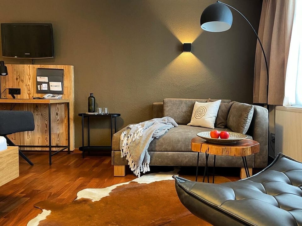 Suite, Balcony | Living area | Flat-screen TV