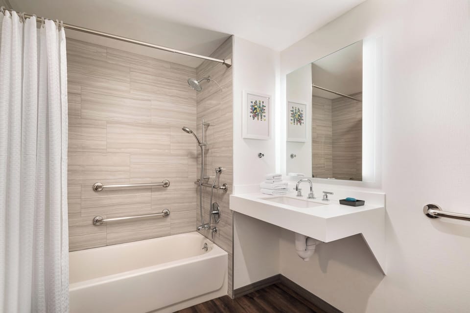 Rainfall showerhead, free toiletries, hair dryer, towels