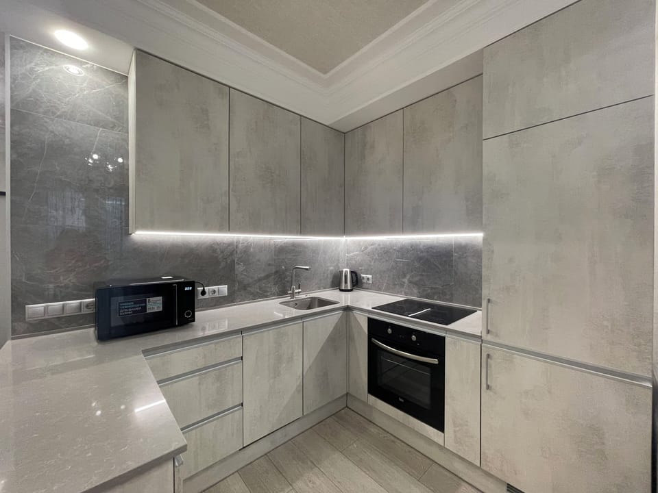 Apartment | Private kitchen | Full-size fridge, microwave, oven, stovetop