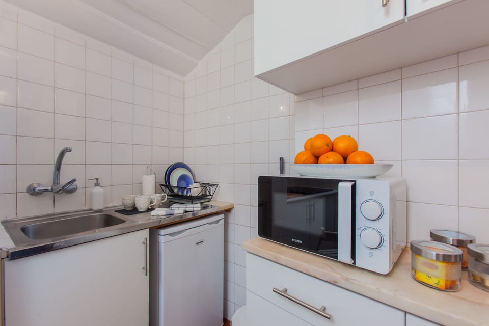 Apartment, 1 Bedroom | Private kitchen | Full-size fridge, microwave, stovetop, espresso maker