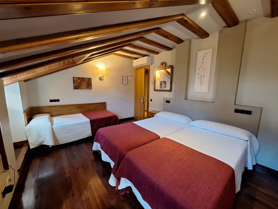 Family room 3 beds Atticc Exterior | Premium bedding, desk, laptop workspace, blackout drapes