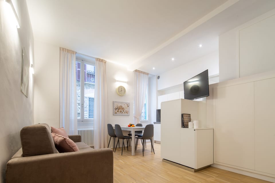 Comfort Apartment | Living area | Flat-screen TV