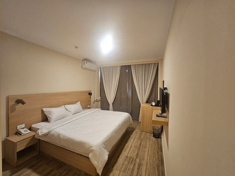 Standard Single Room, City View | Minibar, in-room safe, desk, free WiFi