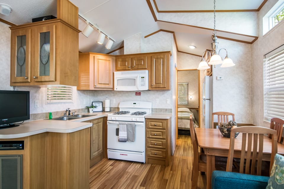 Fridge, cookware/dishes/utensils, dining tables
