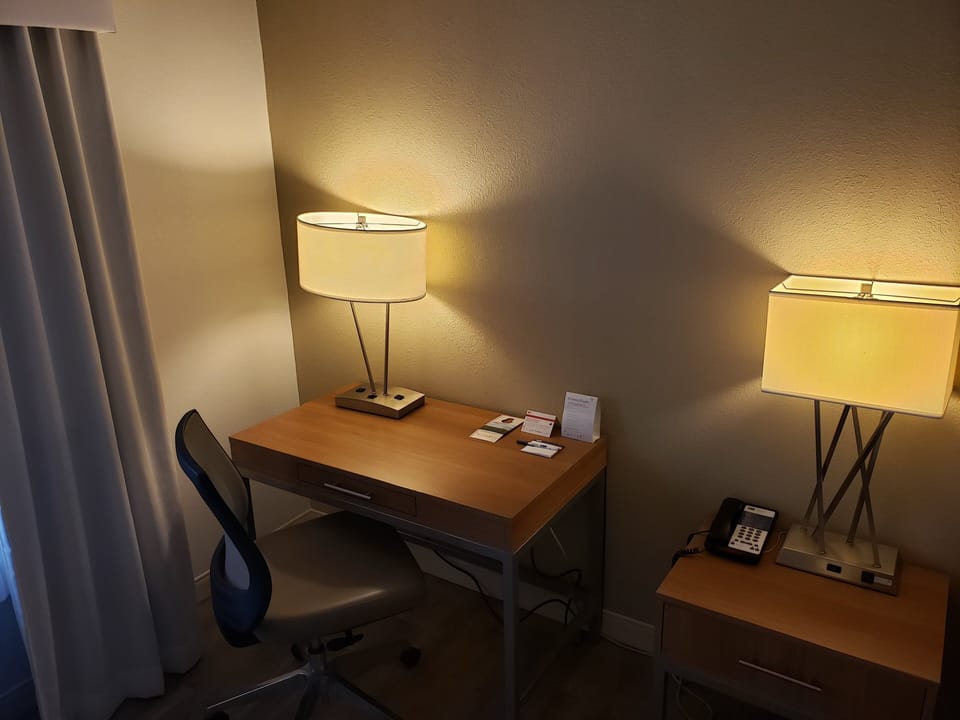 In-room safe, desk, iron/ironing board, cribs (free)