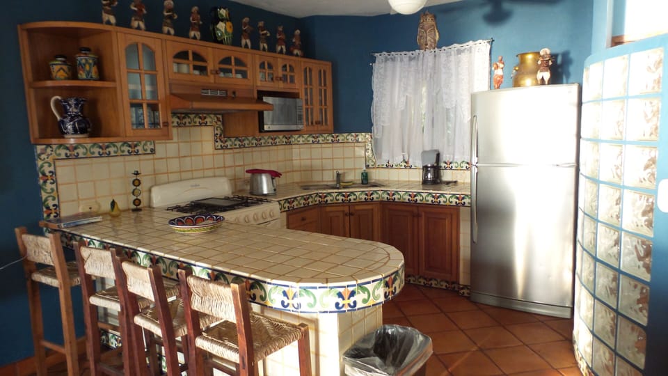 Deluxe Room, 2 Bedrooms | Private kitchen | Mini-fridge, stovetop, coffee/tea maker