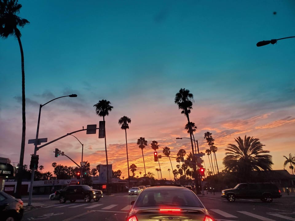 Driving down W. Point Loma at sunset (intersection at Sunset Cliffs Blvd) 