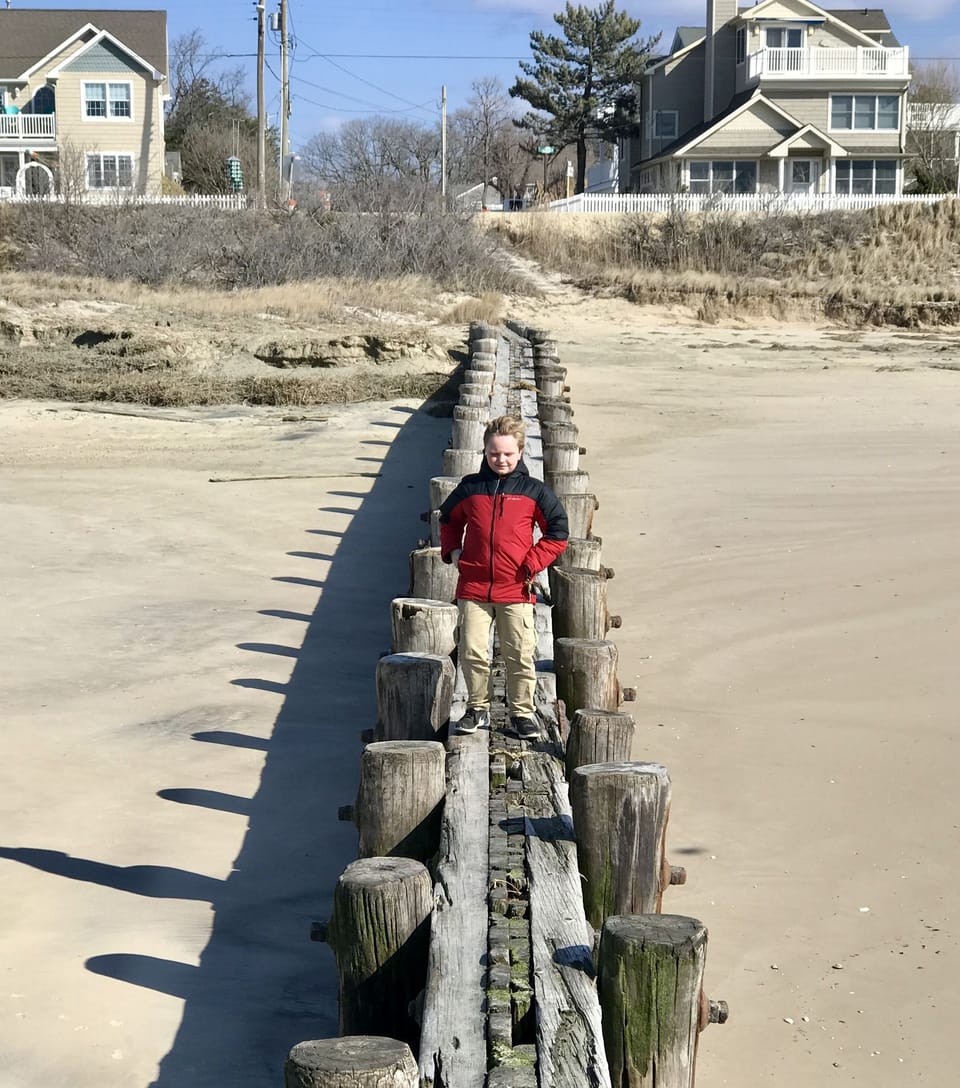 Walking the jetty at the end of my street to the rocks.  Good for fishing.