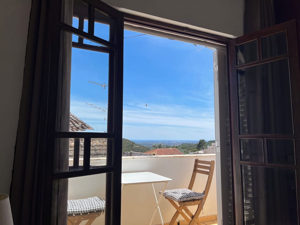 On the balcony you can enjoy the view, the sound of the birds and the 🌞
