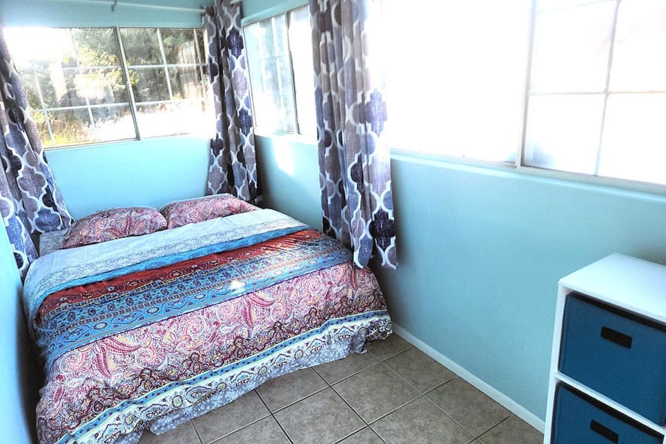 Bedroom 4 -- nice & sunny with direct outdoor access!