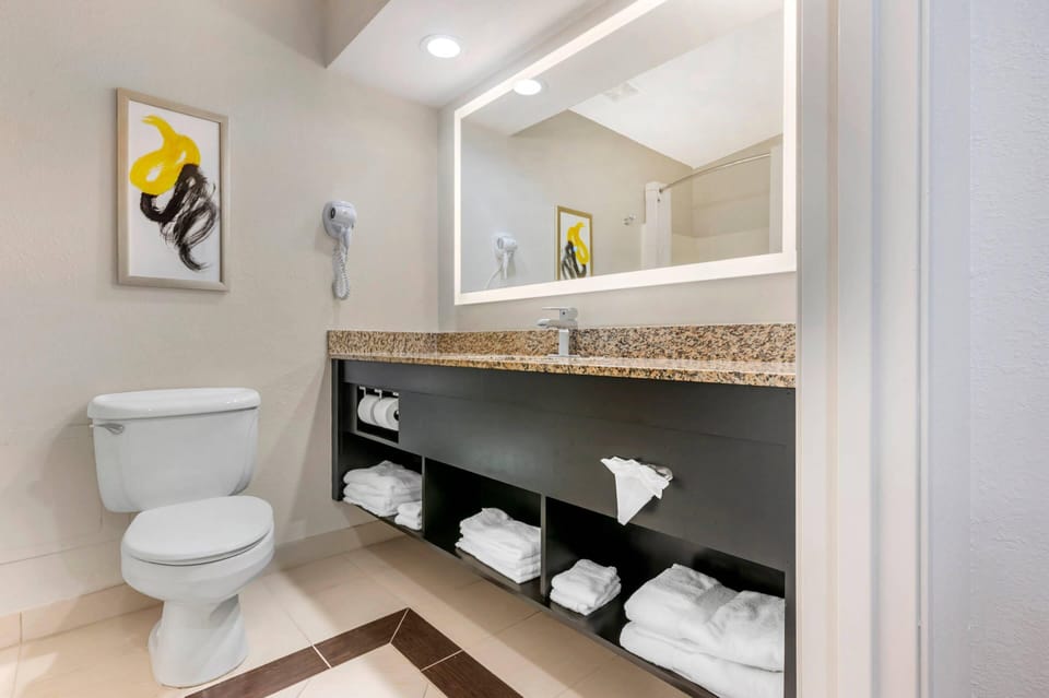 Suite, 2 Queen Beds, Non Smoking | Bathroom | Combined shower/tub, free toiletries, hair dryer, towels