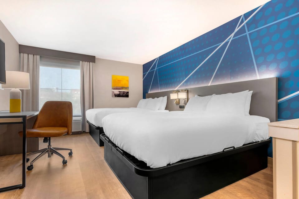 Suite, 2 Queen Beds, Non Smoking | Premium bedding, individually furnished, desk, soundproofing