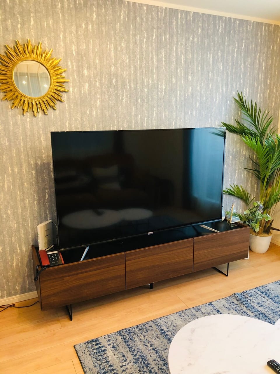 Three-Bedroom Apartment | Living area | 65-inch flat-screen TV with digital channels, TV