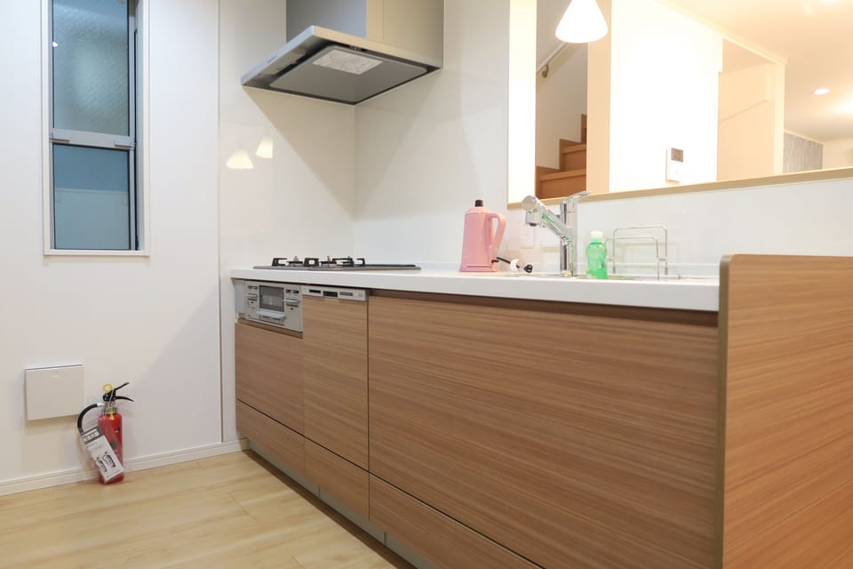 Three-Bedroom Apartment | Private kitchen | Fridge, microwave, oven, stovetop