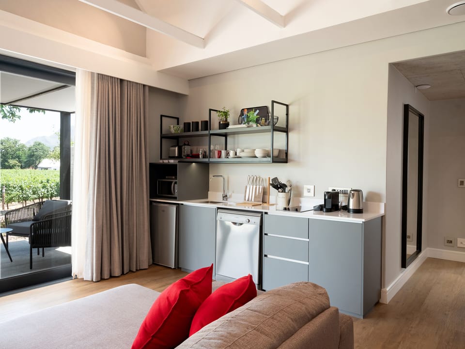 Grand Suite | Private kitchenette | Mini-fridge, espresso maker, coffee/tea maker, electric kettle
