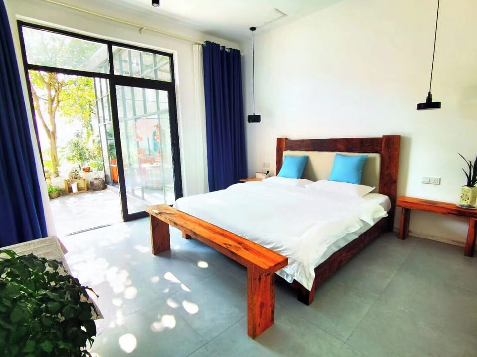 Signature Room | Premium bedding, down comforters, desk, blackout drapes