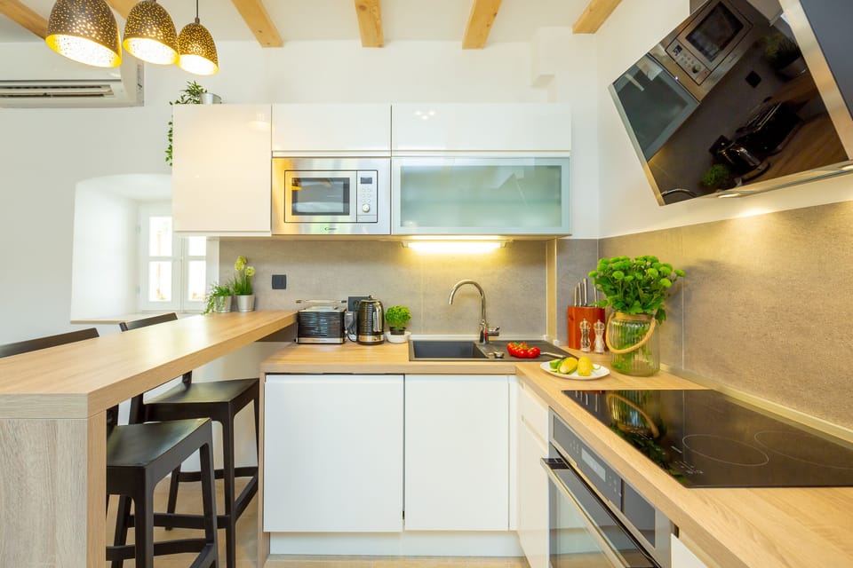 Villa (4 Bedrooms) | Private kitchen | Fridge, microwave, oven, stovetop