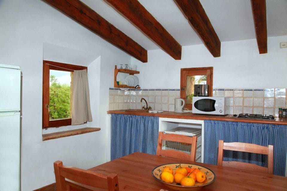 Apartment, 2 Bedrooms, Garden Area | Private kitchenette | Fridge, microwave, stovetop, coffee/tea maker