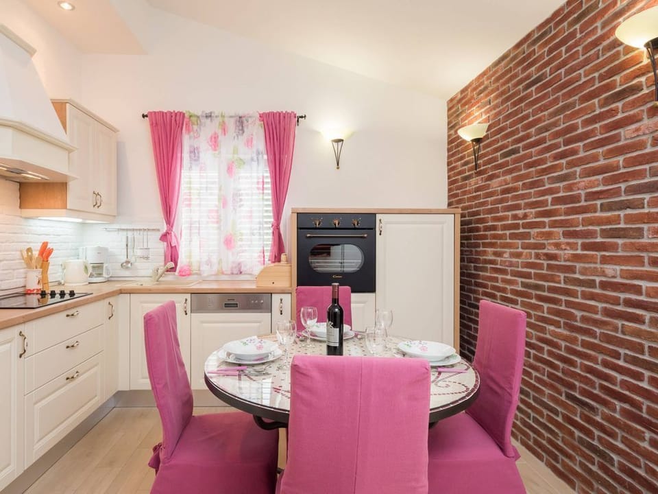 Dinning area with fully equipped kitchen - top floor apt. ANYA