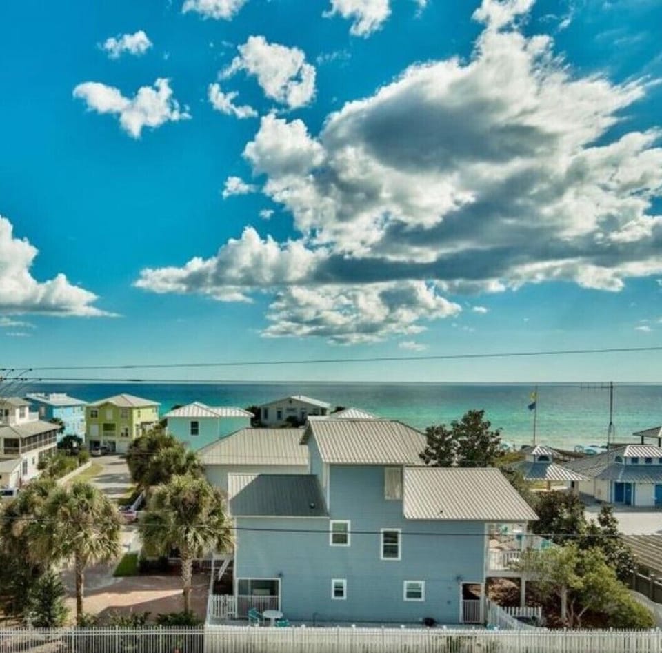 Located in Sunrise Beach, an adorable gated neighborhood with private beach!