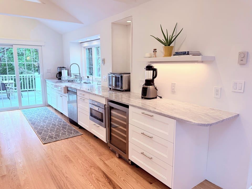 New gourmet kitchen with beverage fridge, microwave drawer, espresso maker
