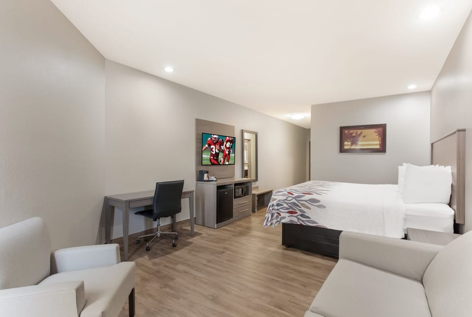 Suite, 1 King Bed, Non Smoking | Desk, iron/ironing board, free cribs/infant beds, rollaway beds
