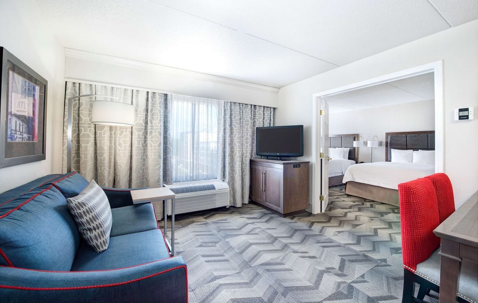 Suite, 2 Queen Beds, Non Smoking, Kitchen | In-room safe, desk, laptop workspace, iron/ironing board