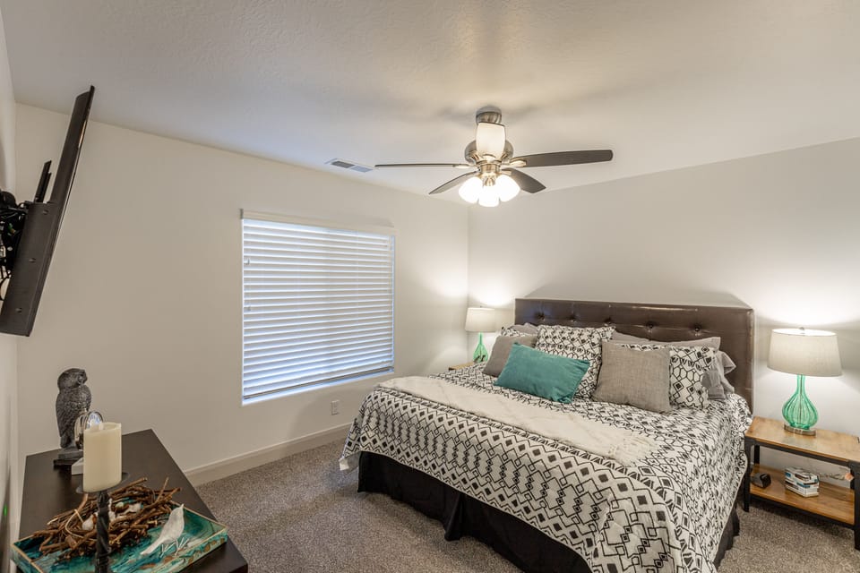 Bedroom 4 - Bedroom 4 includes a King bed, private TV, and walk-in closet.