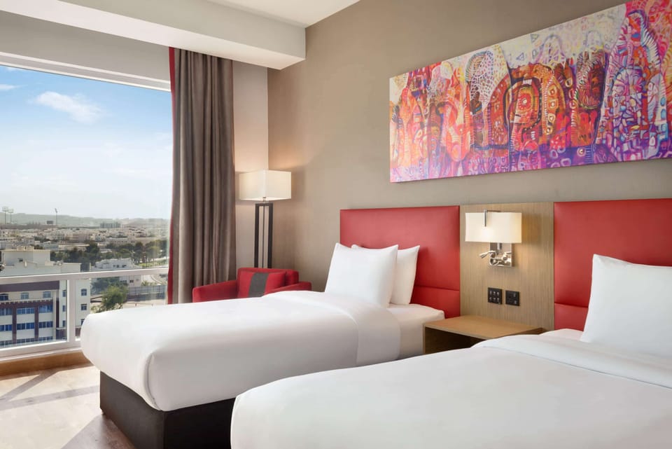 Deluxe Room, 2 Single Beds | Minibar, in-room safe, desk, blackout drapes