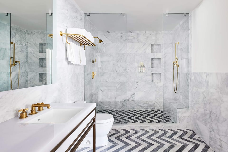 Skyline Penthouse | Bathroom | Shower, rainfall showerhead, designer toiletries, hair dryer