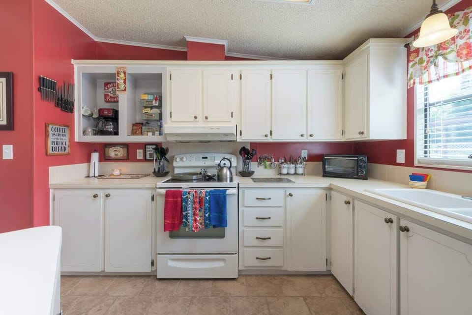 The full stove and stocked Kitchen will make meal preparations simple.