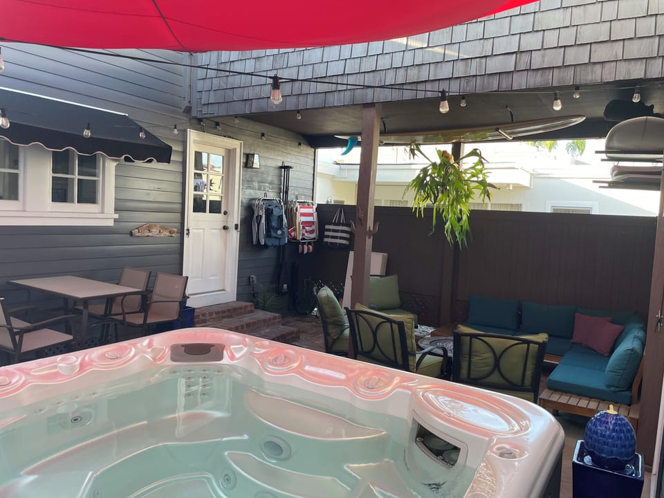 Private courtyard, hot tub, fire pit, lounge seating, grill, dining, fountains 